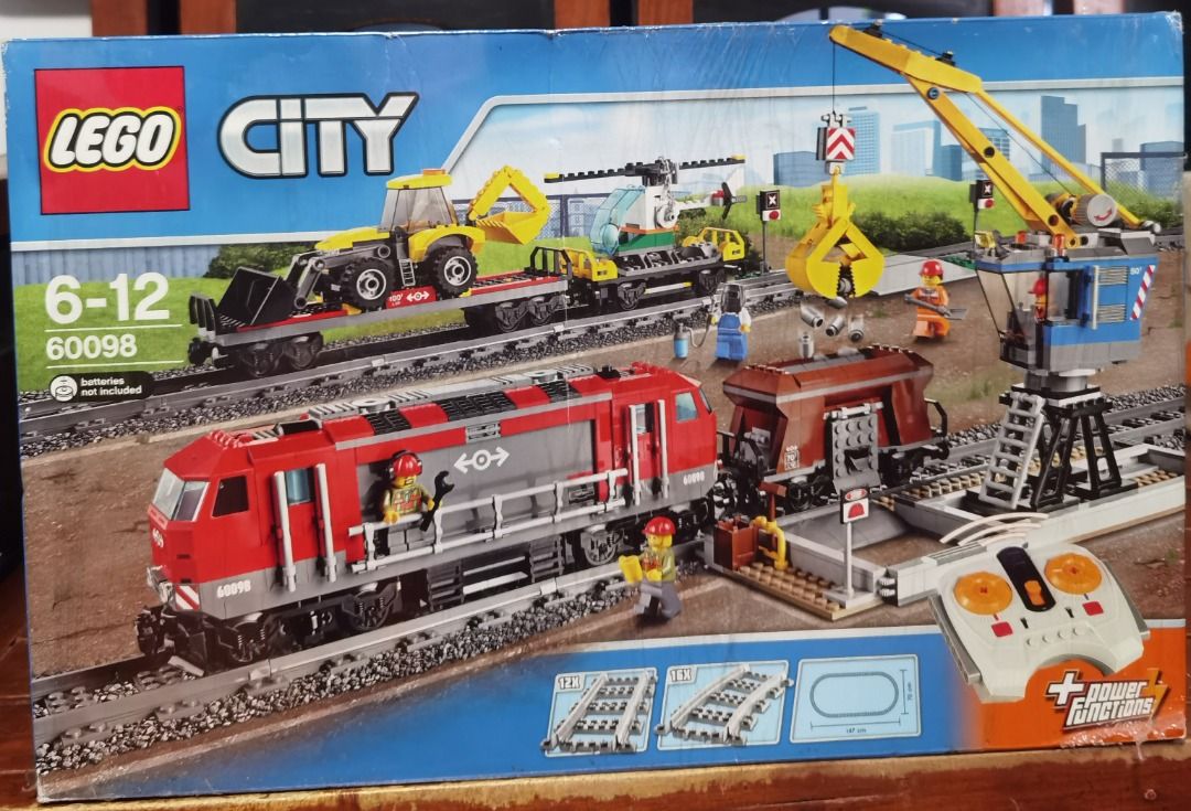 LEGO City Heavy-Haul Train 60098 (Category: Lego & Building Sets) located in Marikina City. Submitted by ericjannie1206 (Listing ID 1464769964, Image 1). Description: - LEGO City Heavy-Haul Train (Set 60098) - Recommended Age: 6-12 years old - Condition: Brand new, wrapped in original plastic shrink wrap - Includes: Motorized red locomotive, freight cars, crane, tracks, vehicles, and infrared remote control - Perfect for LEGO collectors and train