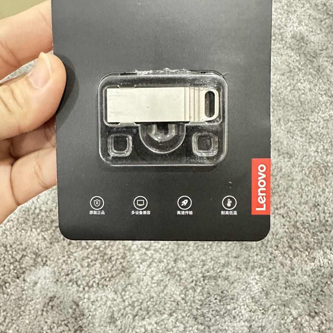 Lenovo Thinkplus USB High-Speed Flash Drive 8GB (Category: Hard Disks & Thumbdrives) located in Paranaque City. Submitted by changingclassic (Listing ID 1464802469, Image 2). Description: - Brand: Lenovo thinkplus - Model: MU221 8G - Capacity: 8GB - Condition: Brand new in sealed original retail packaging - Design: Metallic silver finish with compact lanyard loop - Features: High-speed transfer, temperature resistant, and multi-device compatible 