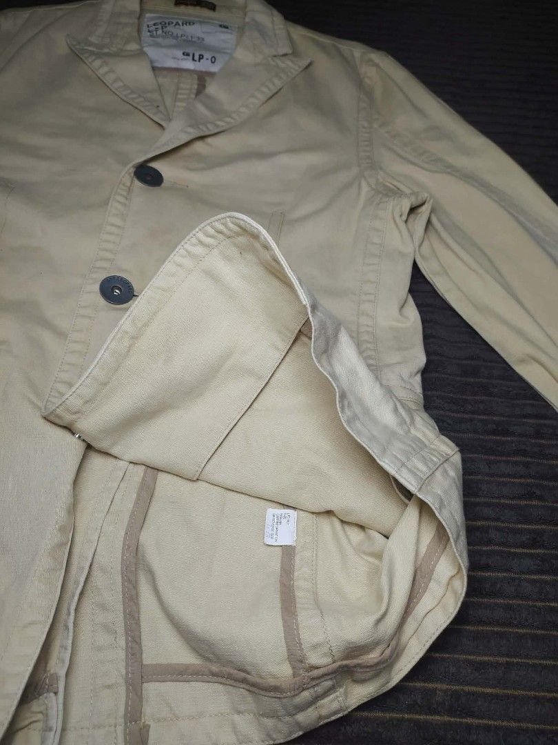 Leopard G-Star Raw Beige Casual Blazer Jacket (Category: Coats, Jackets and Outerwear) located in Manila. Submitted by norathrifted (Listing ID 1464791794, Image 2). Description: - Brand: Leopard by G-Star Raw - Type: Casual blazer jacket - Color: Solid cream beige - Material: 100% Cotton - Closure: Three-button front with embossed Leopard branding - Pockets: Two front flap pockets - Details: Lapel collar, 4-button decorative cuffs, inner style t