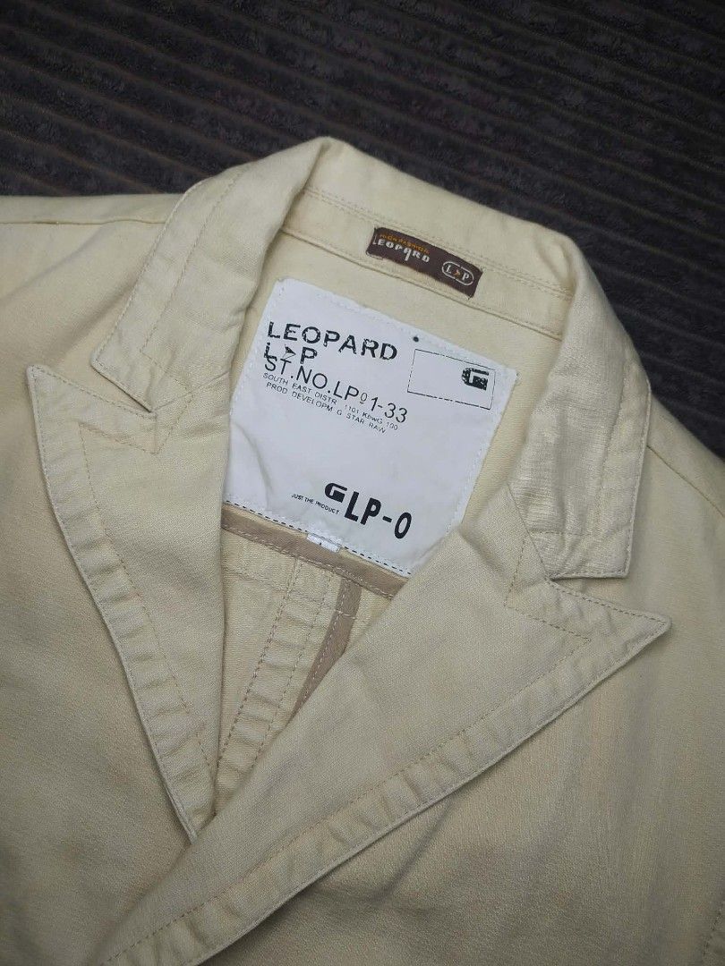 Leopard G-Star Raw Beige Casual Blazer Jacket (Category: Coats, Jackets and Outerwear) located in Manila. Submitted by norathrifted (Listing ID 1464791794, Image 3). Description: - Brand: Leopard by G-Star Raw - Type: Casual blazer jacket - Color: Solid cream beige - Material: 100% Cotton - Closure: Three-button front with embossed Leopard branding - Pockets: Two front flap pockets - Details: Lapel collar, 4-button decorative cuffs, inner style t
