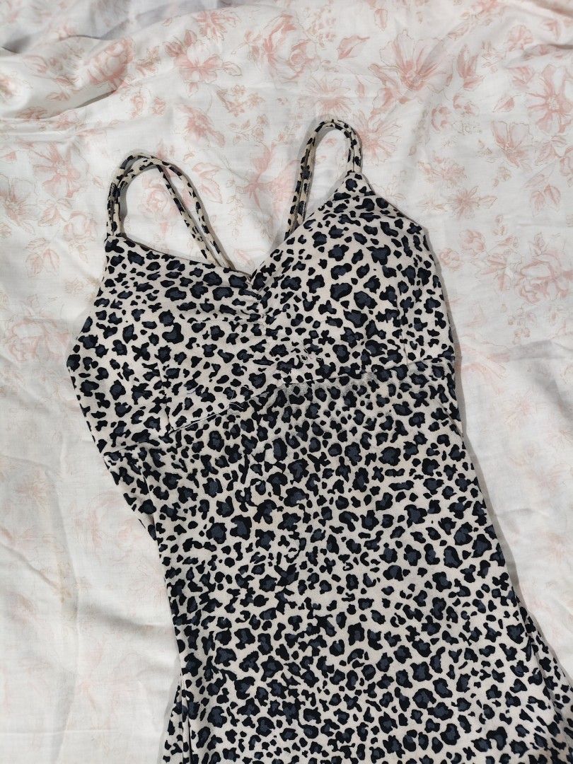 leopard print padded bodycon midi dress (Category: Dresses) located in Bulacan. Submitted by angel.decluttersx (Listing ID 1464878175, Image 2). Description: ww provided s-m no issue stretchable cotton fabric material crisscross spaghetti straps.