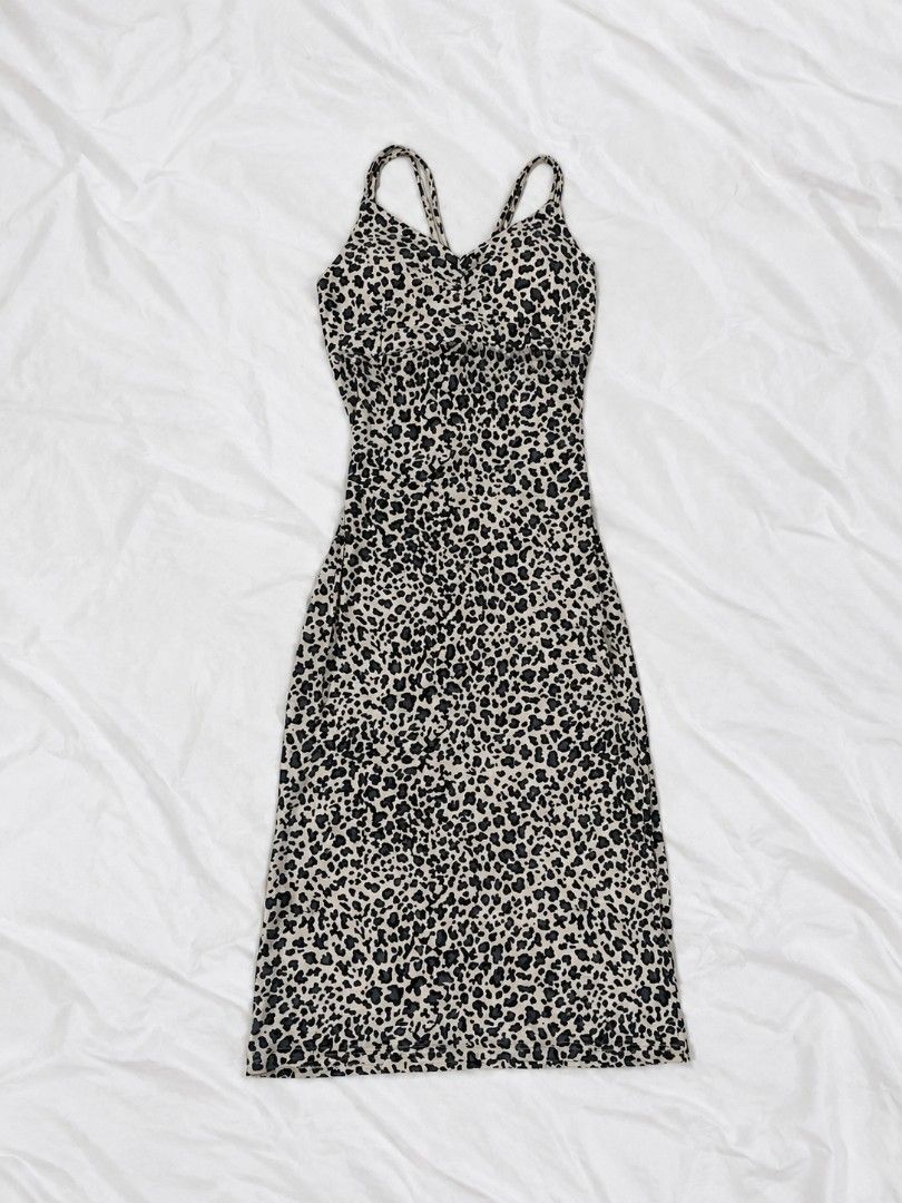 leopard print padded bodycon midi dress (Category: Dresses) located in Bulacan. Submitted by angel.decluttersx (Listing ID 1464878175, Image 1). Description: ww provided s-m no issue stretchable cotton fabric material crisscross spaghetti straps.