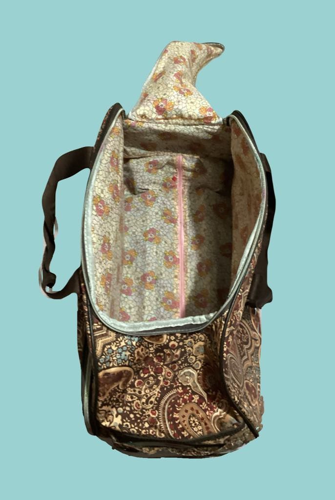 Lesportsac Rolling Duffel Bag (Category: Luggage) located in Paranaque City. Submitted by calm_youngstore7 (Listing ID 1464931085, Image 3). Description: Lesportsac Rolling Duffel Bag Satchel Travel in style with this Luggage Carry On Travel Suitcase. Perfect size for a weekend trip or as a carry on luggage when traveling. Cabin size fit. *Roomy open storage *Easy transition from handheld luggage to to a rolling duffel bag • with hidden retractab