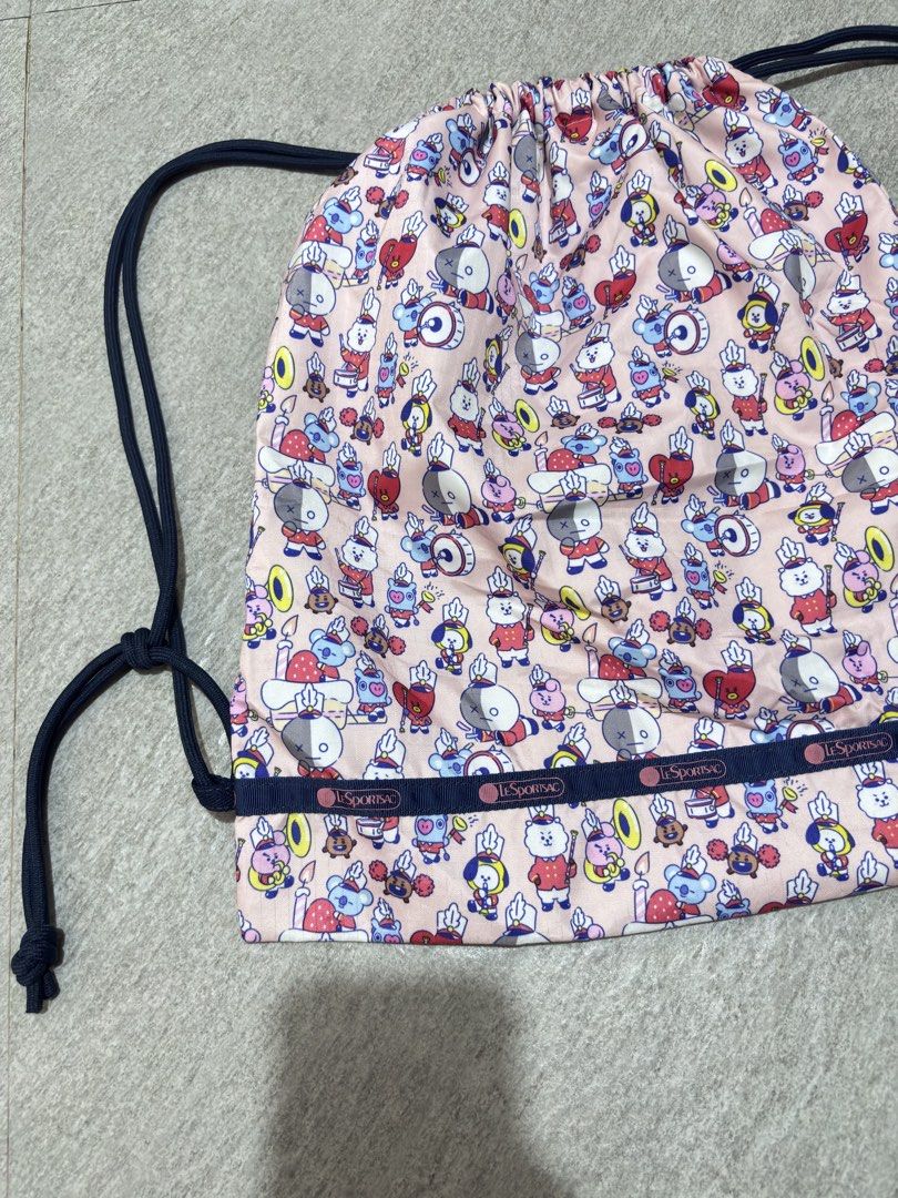 LeSportsac x BT21 Drawstring Backpack (Category: Backpacks) located in Paranaque City. Submitted by dalle_closet (Listing ID 1464814252, Image 3). Description: slightly used pa size: 13.5 x 15 inches.