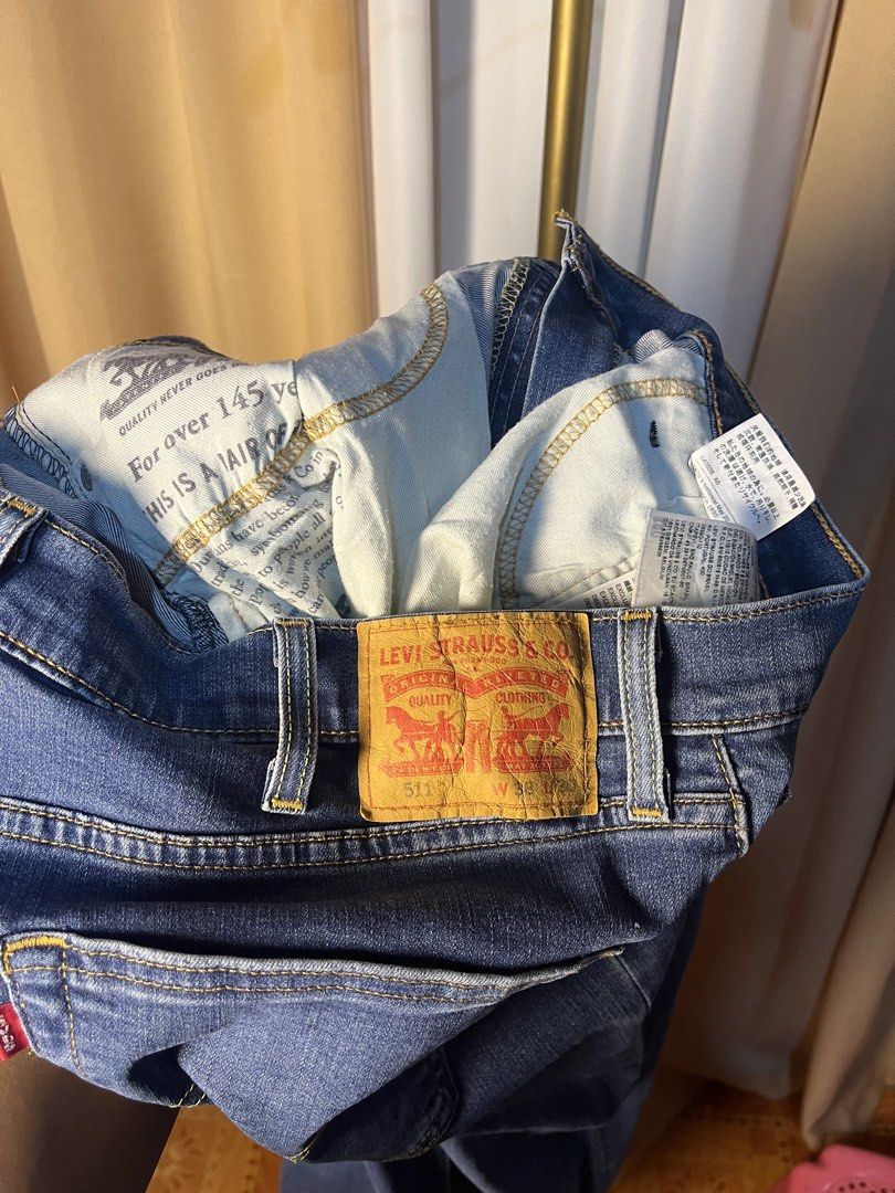 Levi's 511 Performance Slim Jeans W38 L32 (Category: Jeans) located in Kidapawan. Submitted by azythrift (Listing ID 1464917270, Image 1). Description: - Brand/Model: Levi's 511 Performance Jeans - Color/Wash: Dark Wash Blue - Fit/Style: Slim fit with stretch fabric for all-day comfort - Size: W38 L32 - Details: Classic five-pocket setup, zip fly, metal rivets, signature red tab, and leather back patch - Condition: Clean, excellent pre-loved cond
