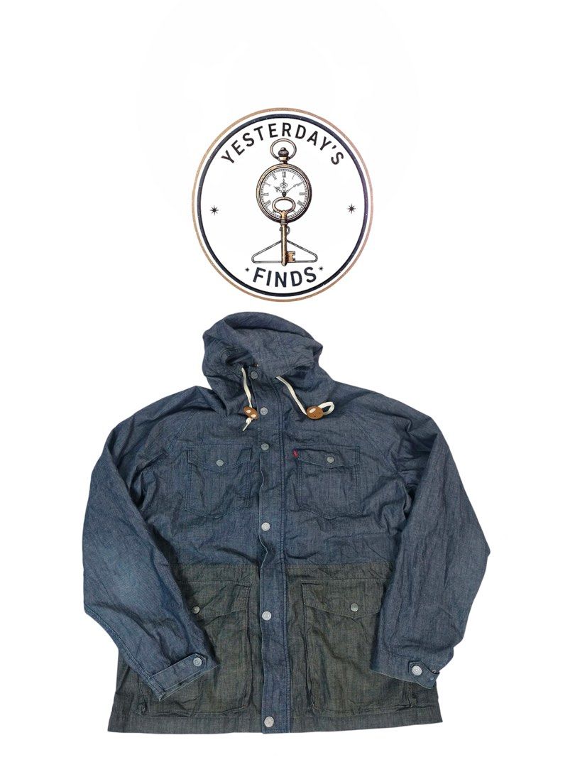 Levi's Blue Denim Hooded Jacket (Category: Coats, Jackets and Outerwear) located in Manila. Submitted by yesterdaysfinds (Listing ID 1464865341, Image 1). Description: Levis Denin SoftJacket Condition : Excellent Size : Large Dimension 👇 Chest : 22 Lenght : 29 Shoulder : 20 Sleeve : 25 📌 - Brand: Levi's - Style: Hooded denim jacket in two-tone blue and dark charcoal - Closure: Button-up front with branded metal buttons - Pockets: 4 front utilit