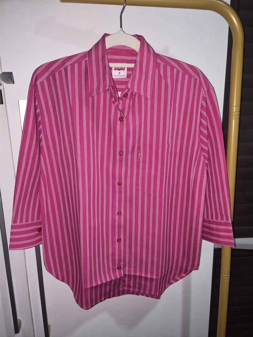 Levi's Striped Button-Up Shirts - Multiple Colors Available (Category: Shirts) located in Taguig. Submitted by chloe_clothingco. (Listing ID 1464390143, Image 2). Description: - Classic Levi's button-up shirts with extra button S-XL only - Features vertical stripes in various colorways - Chest pocket with iconic red Levi's tab - Versatile for casual or smart-casual outfits - Available in multiple sizes and colors.