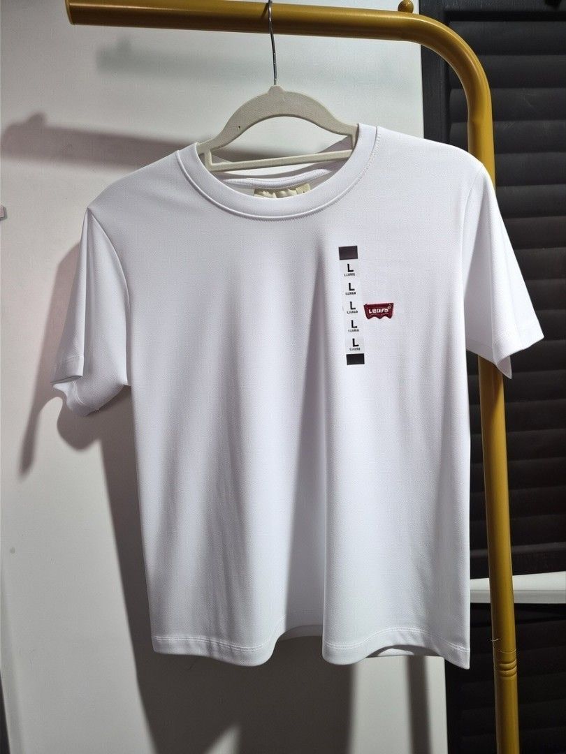 Levi's T-shirt - Multiple Colors Available (Category: Shirts) located in Taguig. Submitted by chloe_clothingco. (Listing ID 1464390473, Image 2). Description: - Basic Levi's T-shirt -small-2xL - Ribbed crew neck - Short sleeves - Small red Levi's logo tab on chest - Ideal for everyday wear - Easily pairs with jeans - Available in multiple colors.