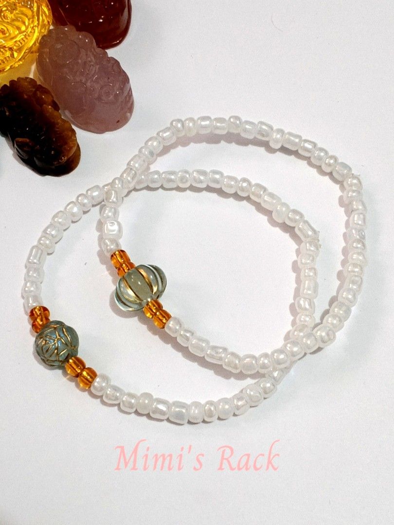 Light Blue Marrakech Pumpkin & Rose White Seed Bead Bracelet (Category: Bracelets) located in Taguig. Submitted by mimisrack (Listing ID 1464890290, Image 2). Description: 🩵A sweet and delicate white seed bead bracelet featuring charming light blue pumpkin and rose charms with beautiful gold-tone detailing. The soft blue charms against the white beads create a lovely, feminine look with a touch of vintage-inspired charm. ✨ -A unique little brace