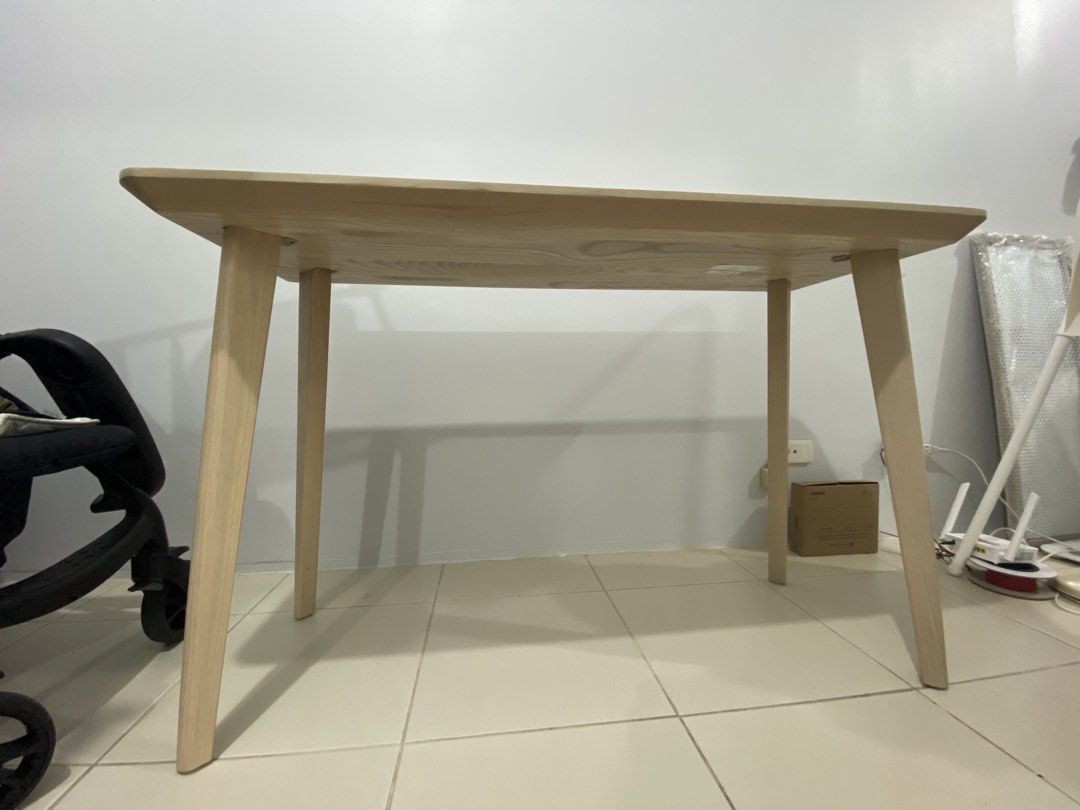 Light Wood Dining Table with Tapered Legs (Category: Tables & Sets) located in Bulacan. Submitted by hannaaaa4533 (Listing ID 1464784353, Image 2). Description: Lisabo table- 10k original price sa ikea - Solid light wood dining table with natural wood grain patterns - Rectangular top featuring safe, rounded corners - Clean minimalist design, ideal for kitchens, dining areas, or study setups - Standard height and length for daily comfort -with dra