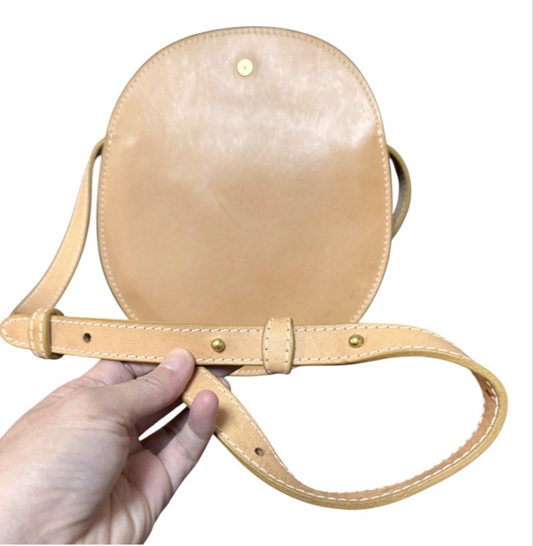 Lindquist Round Leather Shoulder Bag (Category: Cross-body Bags) located in Baguio. Submitted by pwz-eshop (Listing ID 1464827418, Image 3). Description: • Up for Grabs!! • Flaws: Oil Marks on leather. (please see photos) • Guaranteed Authentic! • BRAND: LINDQUIST. • DIMENSIONS: length 8.5", height 9.75", width 1.75", handle drop: 19.5". • SERIAL NUMBER: 3LKCE ZJMI. • COUNTRY OF ORIGIN: Undetermined. • MATERIAL: Leather. • COLOR: Tan. • Lining: L