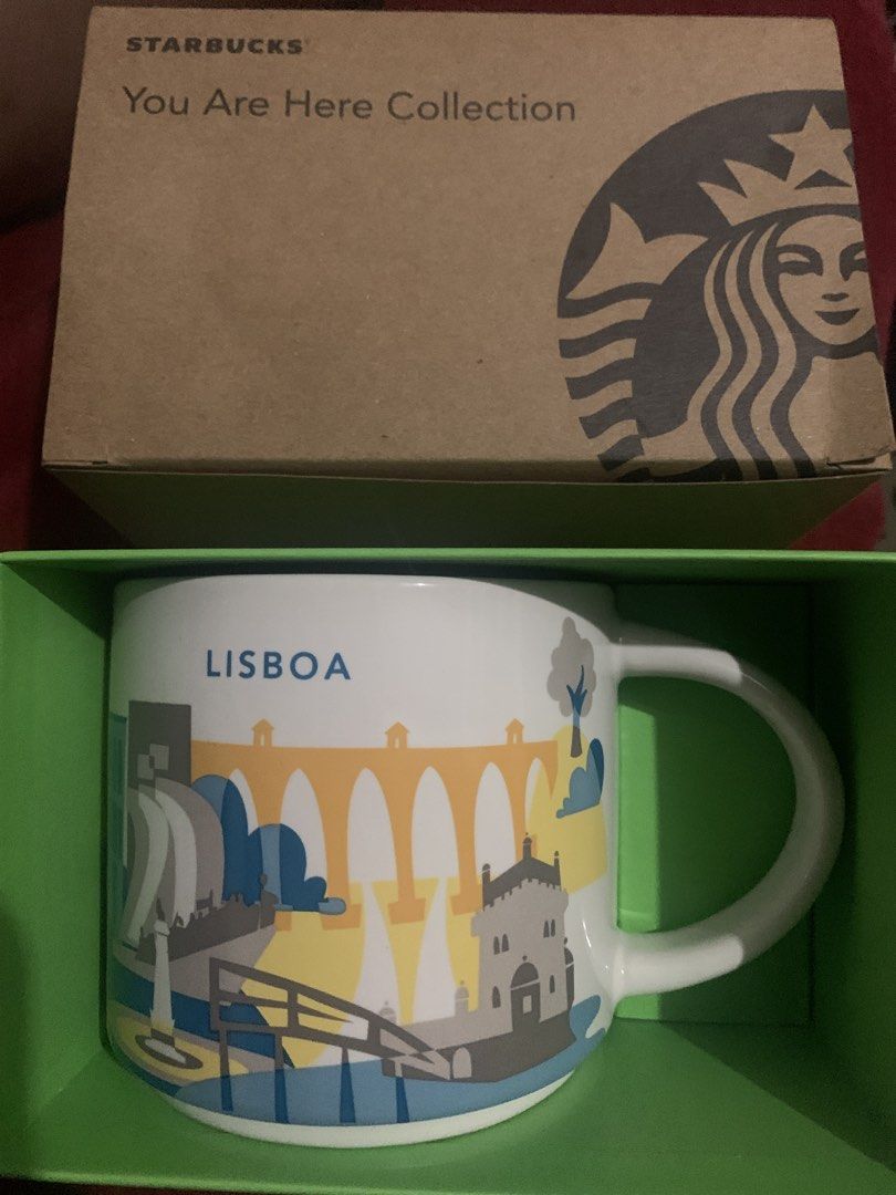 Lisboa Mug - Starbucks (Category: Coffee & Tea Tableware) located in Makati City. Submitted by emenem.m (Listing ID 1464837227, Image 1). Description: - Item: Starbucks You Are Here Collection Mug - Lisboa edition - Condition: Brand new, unused, kept in box - Design: Features iconic landmarks of Lisboa on white ceramic - Inclusions: Comes with original branded cardboard box and inner green packaging - Perfect for collectors or as a gift.