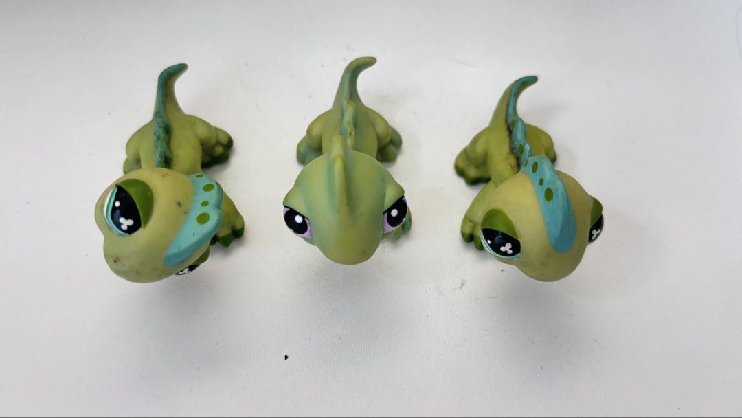 Littlest Pet Shop Chameleon Iguana Lizard Figures (Category: Figurines & Statues) located in Quezon City. Submitted by mommyclutter (Listing ID 1464826050, Image 1). Description: authentic Littlest Pet Shop green lizard figures - Features cute blue crests, green spots, and large expressive eyes - Crouching plastic poses, great for display or shelf expansion - Ideal for LPS collectors or replacing missing pets .