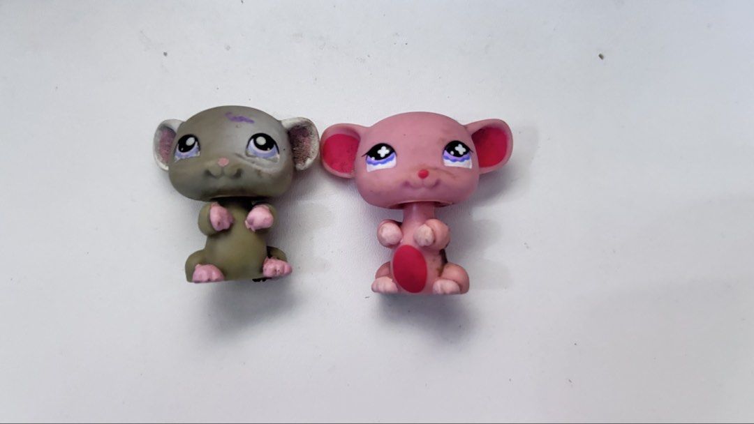 Littlest Pet Shop Mouse Figures LPS Pair (Category: Figurines & Statues) located in Quezon City. Submitted by mommyclutter (Listing ID 1464827065, Image 1). Description: - Includes 1 gray mouse (purple head markings) and 1 pink mouse (pink belly circle) - Features classic LPS purple eyes and big round ears - Bobbleheads are fully intact and working - Selling as a set - Perfect addition to your LPS collection .