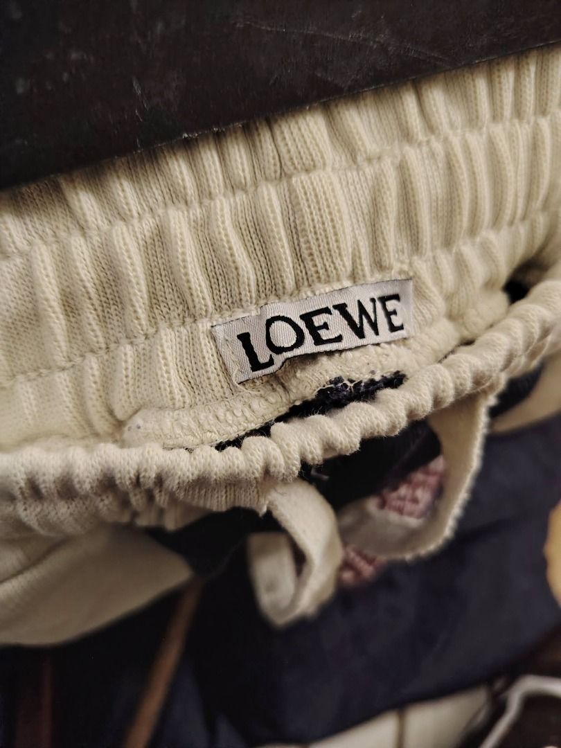 LOEWE X GHIBLI STUDIOS EMBROIDERED DESIGN SHORT // 26-32 (Category: Luxury Apparel) located in Legazpi City. Submitted by urbangarmentsarch4500 (Listing ID 1464866733, Image 3). Description: LOEWE X GHIBLI STUDIOS EMBROIDERED DESIGN SHORT Good Condition W 26-32 L 18 Leg Opening 11 Complete tags minimal stain (Check last 2 pics) Color rate 9.7/10 GRAB 650 (Automatically YOURS)⛓️ --- ‼️w/ FREE STICKERS FOR EVERY PURCHASE⁉️ 🛒🛒🛒 BUY. SELL. TRADE. 
