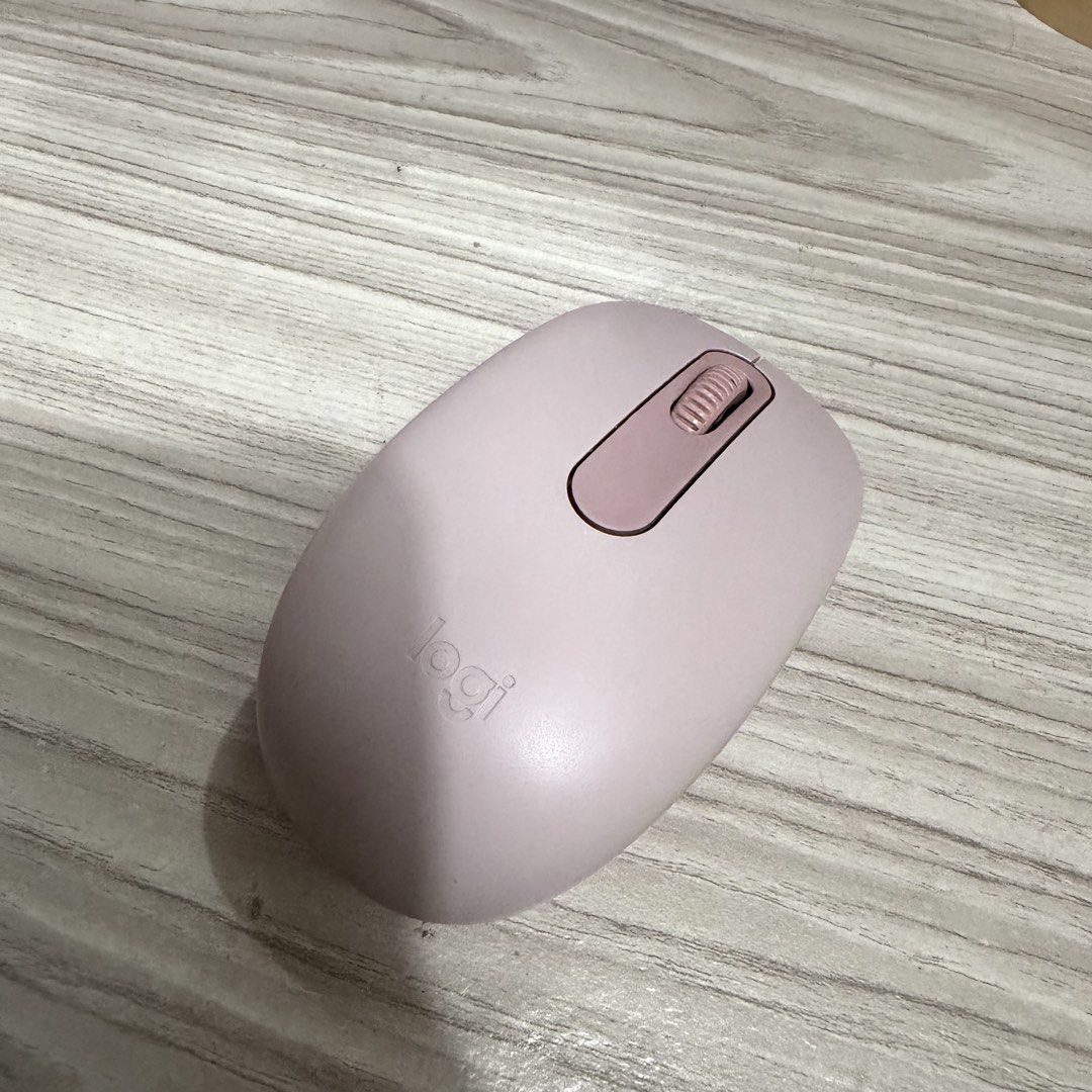 Logitech M196 Wireless Mouse Rose Pink (Category: Mouse & Mousepads) located in Davao. Submitted by tingz444less (Listing ID 1464896653, Image 1). Description: - Model: Logitech M196 Wireless Mouse - Color: Cute Pink - Connectivity: Bluetooth (no dongle needed) - Design: Compact and lightweight, perfect for bags - Features: Clean surface and smooth scrolling wheel - Accessibility: Easy-access battery compartment on the underside - Ideal for: Dail