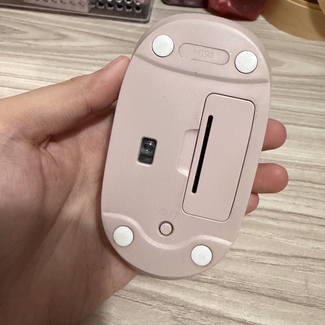 Logitech M196 Wireless Mouse Rose Pink (Category: Mouse & Mousepads) located in Davao. Submitted by tingz444less (Listing ID 1464896653, Image 2). Description: - Model: Logitech M196 Wireless Mouse - Color: Cute Pink - Connectivity: Bluetooth (no dongle needed) - Design: Compact and lightweight, perfect for bags - Features: Clean surface and smooth scrolling wheel - Accessibility: Easy-access battery compartment on the underside - Ideal for: Dail