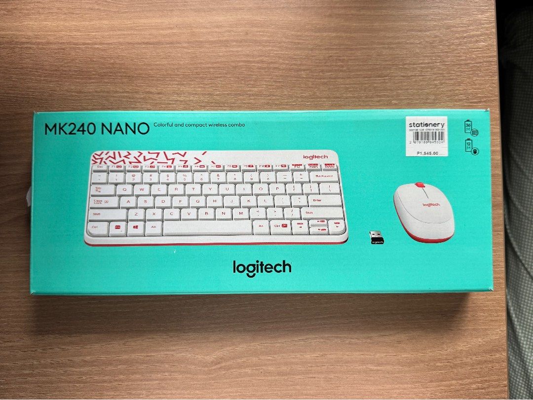 Logitech MK240 Nano Wireless Keyboard And Mouse (Category: Computer Keyboard) located in Rizal. Submitted by yowfaveariesdeclutter (Listing ID 1464827188, Image 2). Description: - Model: Logitech MK240 Nano Wireless Keyboard and Mouse Set - Design: Eye-catching white and red color scheme with abstract pattern - Condition: Brand new, unused contents inside original packaging - Inclusions: Original box, USB receiver, and fresh Duracell batteries - 