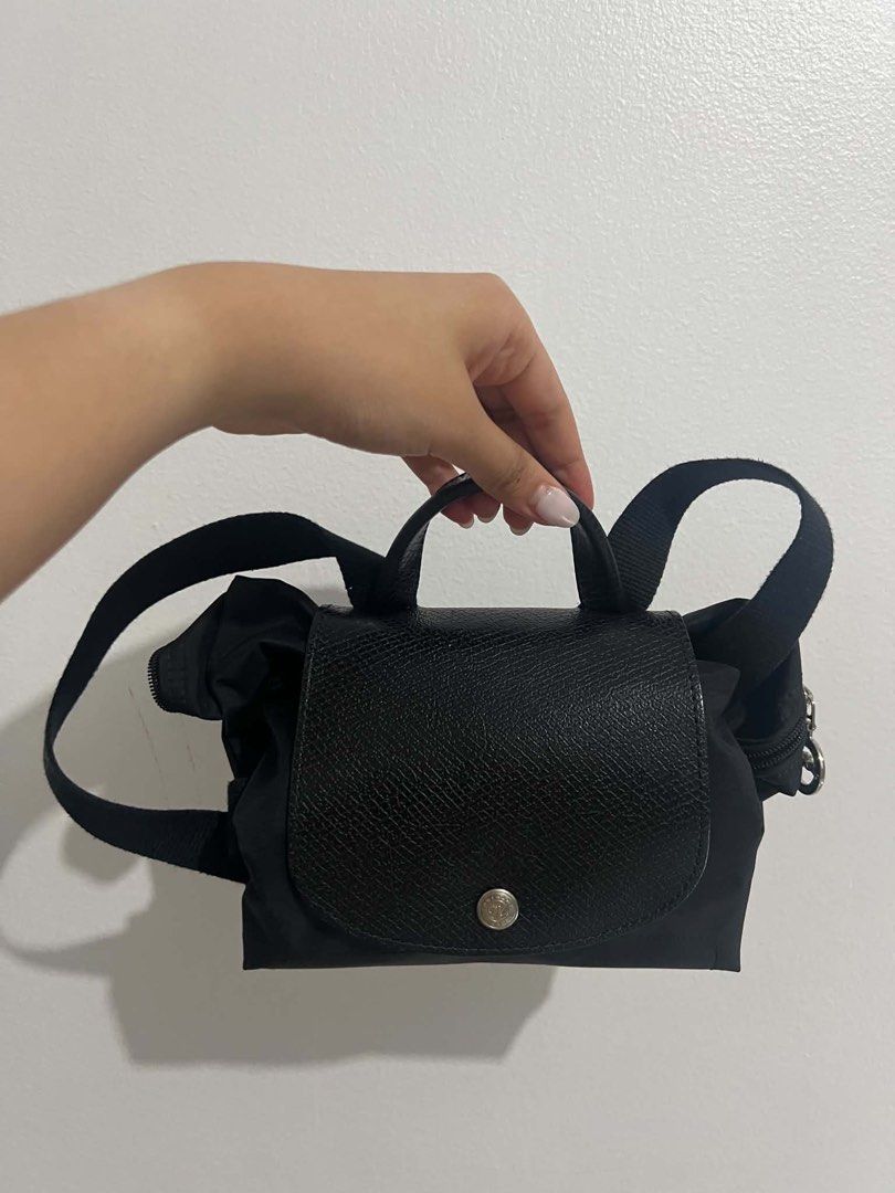 Longchamp Le Pliage Black Nylon Backpack (Category: Backpacks) located in Quezon City. Submitted by migswee07 (Listing ID 1464872009, Image 3). Description: Longchamp Le Pliage Backpack in Black M 7k Negotiable Very Lightly Used Sign of Use: a little shine on the canvas.