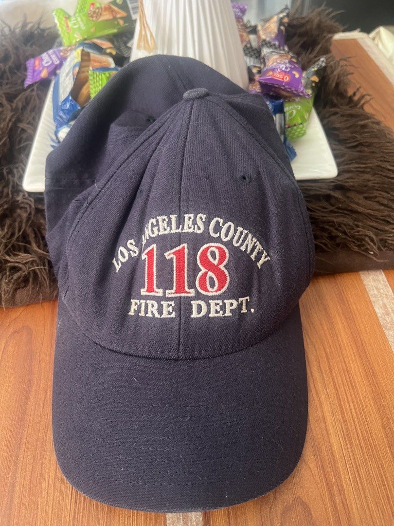 Los Angeles County Fire Dept 118 Flexfit Cap (Category: Caps & Hats) located in Manila. Submitted by declutteringlangpo (Listing ID 1464780569, Image 1). Description: - Official Los Angeles County Fire Department Station 118 baseball cap - Color: Dark blue with premium embroidered lettering on front and interior backing - Brand/Fit: Yupoong Flexfit band, Size L-XL - Material: 63% acrylic, 15% wool, 2% polyurethane spandex - Condition: Clean insid