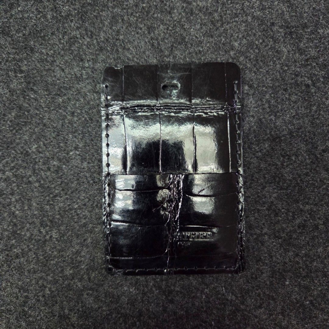 Louis Vuitton Crocodile leather ID case (Category: Wallets & Card holders) located in Quezon City. Submitted by dexter0381 (Listing ID 1464959485, Image 2). Description: - Color & Material: Premium black LV Crocodile leather - Design: Practical clear ID window on one side and a clean back panel with subtle brand lettering - Durability: Neatly stitched edges all around for added strength - Fit: Compact size that easily holds standard IDs and cards