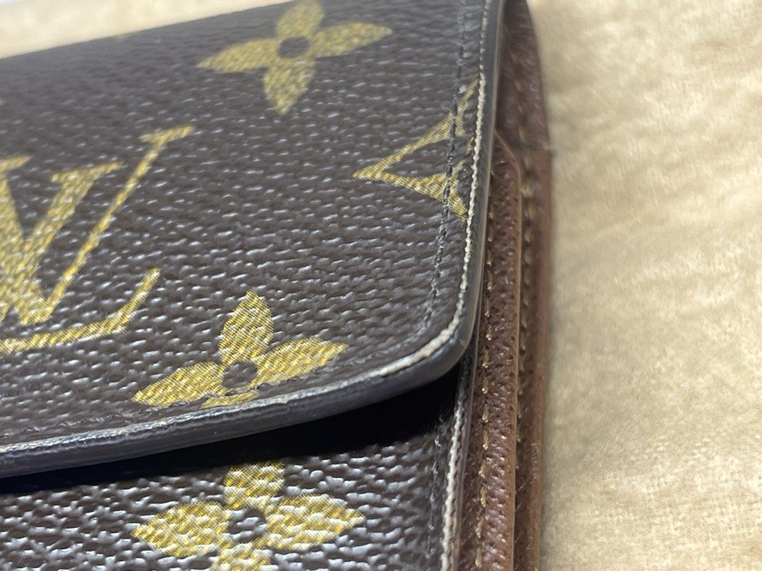 Louis Vuitton Monogram Canvas Wallet (Category: Luxury Bags & Wallets) located in Malabon City. Submitted by demenice (Listing ID 1464863479, Image 2). Description: - Authentic Louis Vuitton monogram canvas wallet in classic brown - Features secure snap closure and elegant gold-tone hardware - Interior lined with premium leather, equipped with card slots and multiple compartments - Condition: in mint condition - Inclusions: Comes with original du