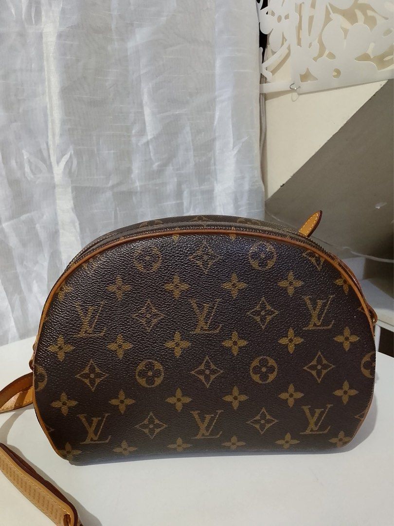 Louis Vuitton Monogram Canvas Crossbody Bag (Category: Luxury Bags & Wallets) located in Quezon City. Submitted by luxuriesbymichiika (Listing ID 1464900158, Image 2). Description: - Iconic monogram canvas with rich brown leather trim - Secure top-zip closure and convenient front slip pocket - Structured dome silhouette with an adjustable shoulder strap - Gleaming gold-tone hardware accents - Clean interior and exterior with natural cowhide leath