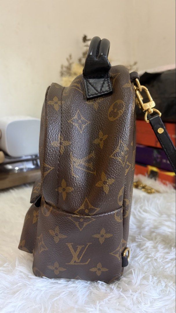 Louis Vuitton Monogram Palm Springs Mini Backpack (Category: Luxury Bags & Wallets) located in Dumaguete. Submitted by freshcornerbyyeng (Listing ID 1464783581, Image 2). Description: - Authentic Louis Vuitton monogram canvas mini backpack - Dark brown leather top handle and adjustable shoulder straps - Classic gold-tone hardware throughout - Front zipper pocket with black leather pull detail - Secure interior main compartment with dual zip closu