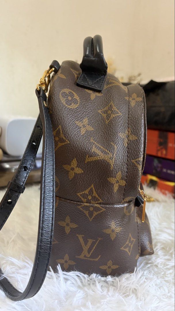Louis Vuitton Monogram Palm Springs Mini Backpack (Category: Luxury Bags & Wallets) located in Dumaguete. Submitted by freshcornerbyyeng (Listing ID 1464783581, Image 3). Description: - Authentic Louis Vuitton monogram canvas mini backpack - Dark brown leather top handle and adjustable shoulder straps - Classic gold-tone hardware throughout - Front zipper pocket with black leather pull detail - Secure interior main compartment with dual zip closu