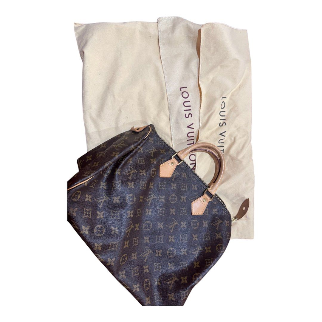Louis Vuitton Monogram Speedy 30 Handbag (Category: Luxury Bags & Wallets) located in Lingayen. Submitted by lux_thrift (Listing ID 1464829301, Image 1). Description: location pangasinan with 2 free dust bags included no flaws .