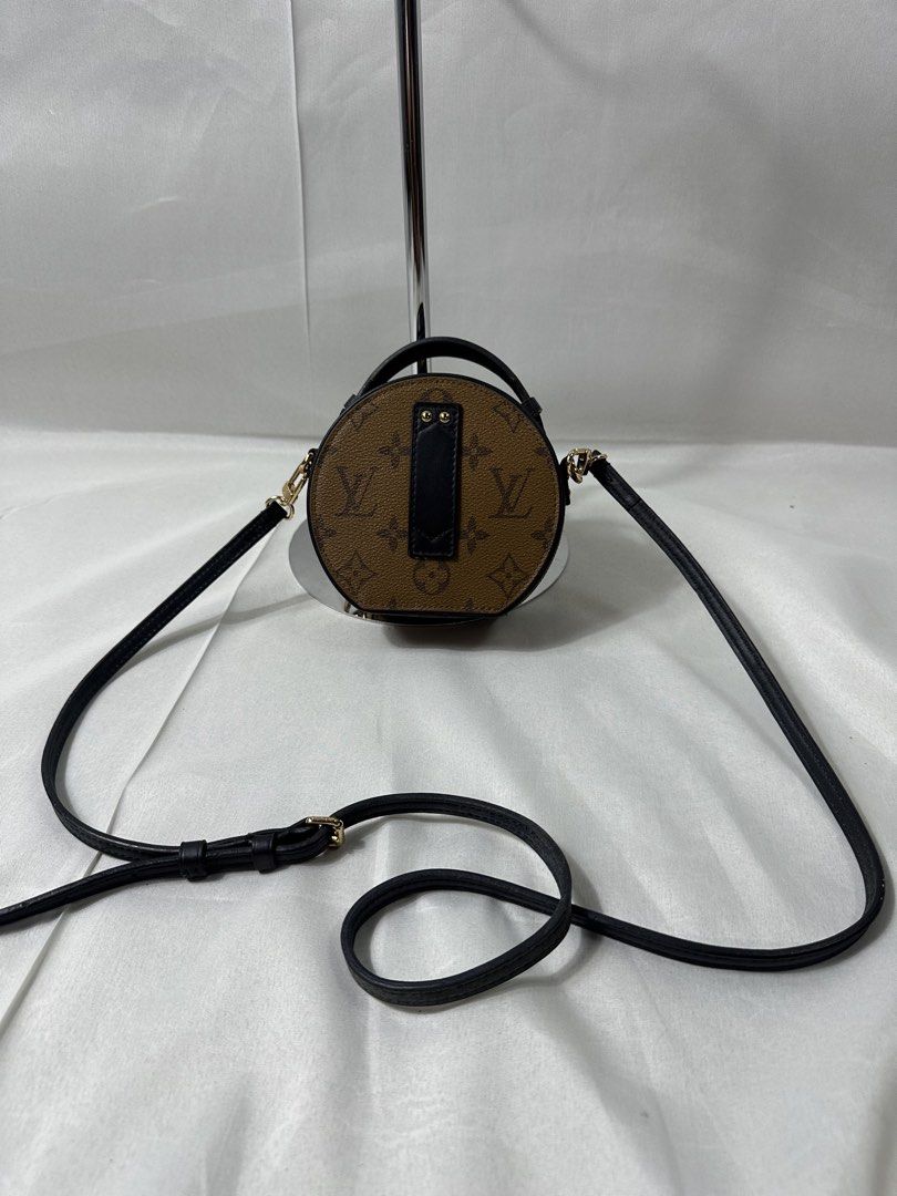 Louis Vuitton Reverse Monogram Canvas Mini Bag (Category: Luxury Bags & Wallets) located in Cabanglasan. Submitted by thefashiongarage.co (Listing ID 1464831509, Image 2). Description: Title - Louis Vuitton Model/Name - Reverse Mini Boite Chapeau Size on Tag - Conditiion - Excellent Condition with minimal sing of wear - Missing 1 Puller - No Cracks Dimension (WxLxH) - Category- Luxury Fitting - Made in - Spain Material - Leather Color - Brown/Bla