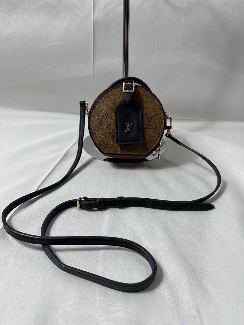 Louis Vuitton Reverse Monogram Canvas Mini Bag (Category: Luxury Bags & Wallets) located in Cabanglasan. Submitted by thefashiongarage.co (Listing ID 1464831509, Image 1). Description: Title - Louis Vuitton Model/Name - Reverse Mini Boite Chapeau Size on Tag - Conditiion - Excellent Condition with minimal sing of wear - Missing 1 Puller - No Cracks Dimension (WxLxH) - Category- Luxury Fitting - Made in - Spain Material - Leather Color - Brown/Bla