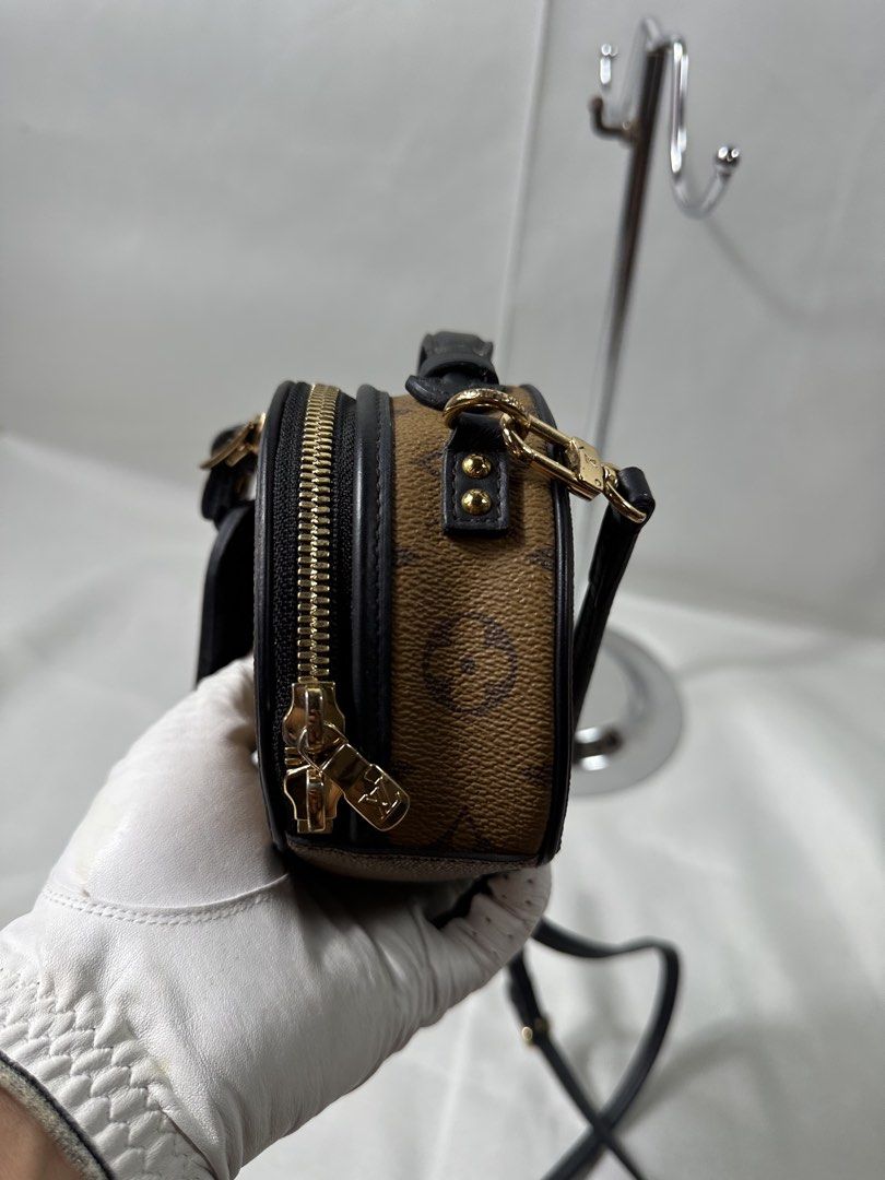 Louis Vuitton Reverse Monogram Canvas Mini Bag (Category: Luxury Bags & Wallets) located in Cabanglasan. Submitted by thefashiongarage.co (Listing ID 1464831509, Image 3). Description: Title - Louis Vuitton Model/Name - Reverse Mini Boite Chapeau Size on Tag - Conditiion - Excellent Condition with minimal sing of wear - Missing 1 Puller - No Cracks Dimension (WxLxH) - Category- Luxury Fitting - Made in - Spain Material - Leather Color - Brown/Bla