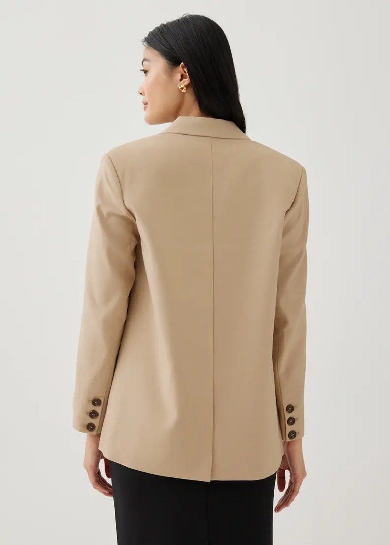Love Bonito oversized blazer (Category: Coats, Jackets and Outerwear) located in Manila. Submitted by _jaspreloved (Listing ID 1464784882, Image 2). Description: Love Bonito Carmie Oversized Blazer in Khaki good condition with a bit of running on the back (barely noticeable) SHIPPING FROM PACO MANILA MOP: Gcash / Maya / BPI SHIPPING: GRAB / LALAMOVE / JNT / other couriers - buyer to book .