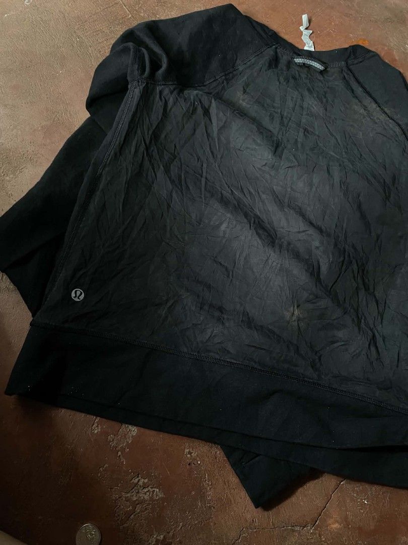 Lululemon Athletica Black Sweatshirt Size 6 (Category: Coats, Jackets and Outerwear) located in Gumaca. Submitted by makuliti (Listing ID 1464821845, Image 3). Description: - Brand: Lululemon - Color: Classic Black - Size: 6 (tag attached) - Style: Long sleeve crewneck pullover with front V-stitch detail - Details: Contrast panels at back yoke and shoulders, ribbed cuffs and hem - Safety/Design: Small reflective logo on lower left back hem - Mate