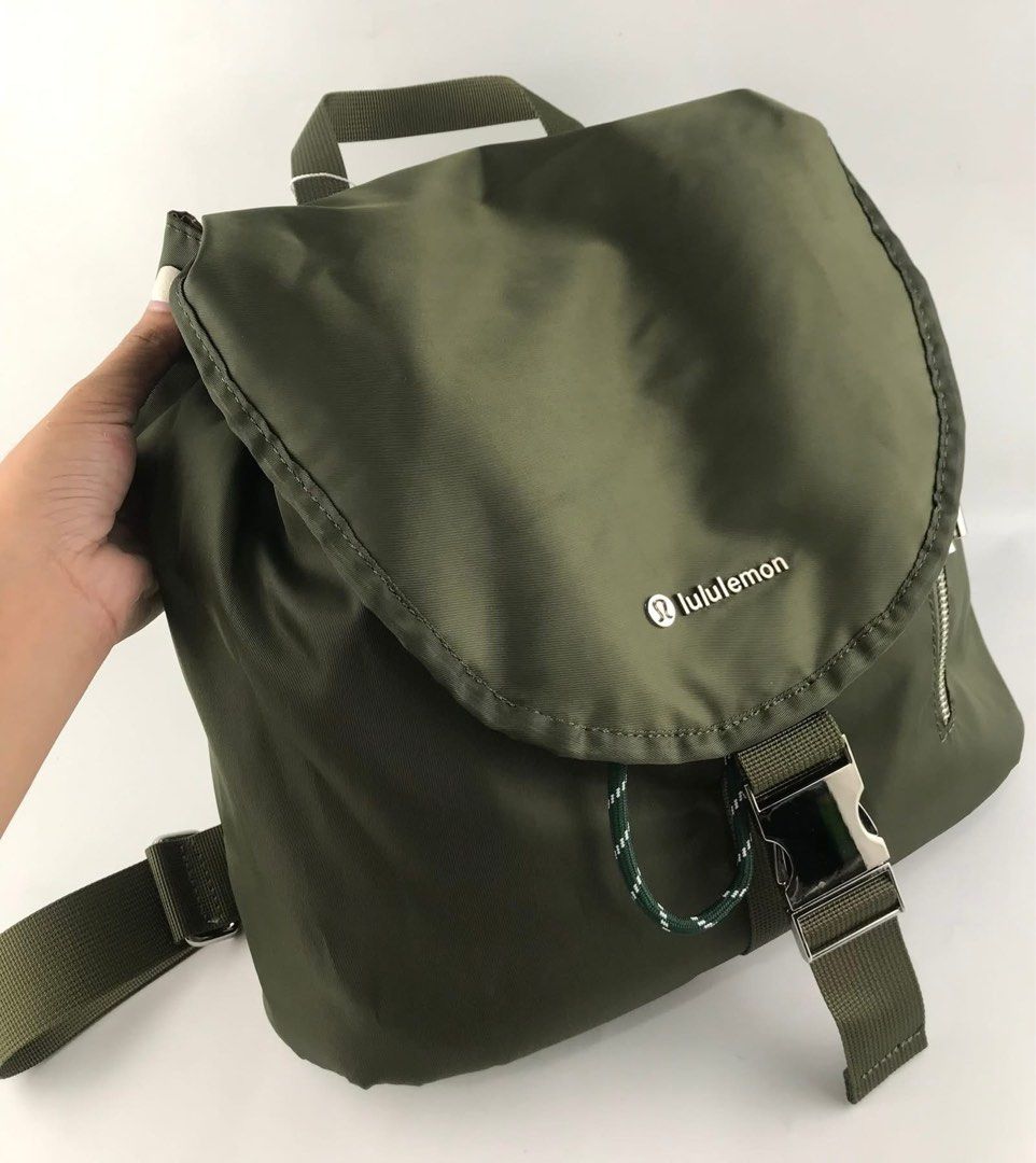Lululemon Nylon Backpack Bag (Category: Backpacks) located in Bacoor. Submitted by faith.hope.love28 (Listing ID 1464830497, Image 2). Description: - Brand new with tag still attached - Material: 100% nylon body with recycled polyester lining - Closure: Secure buckle and drawstring main compartment - Pockets: Front flap side zip pocket, interior zippered pocket, and slip pocket - Comfort & Carry: Adjustable shoulder straps and top grab handle - C