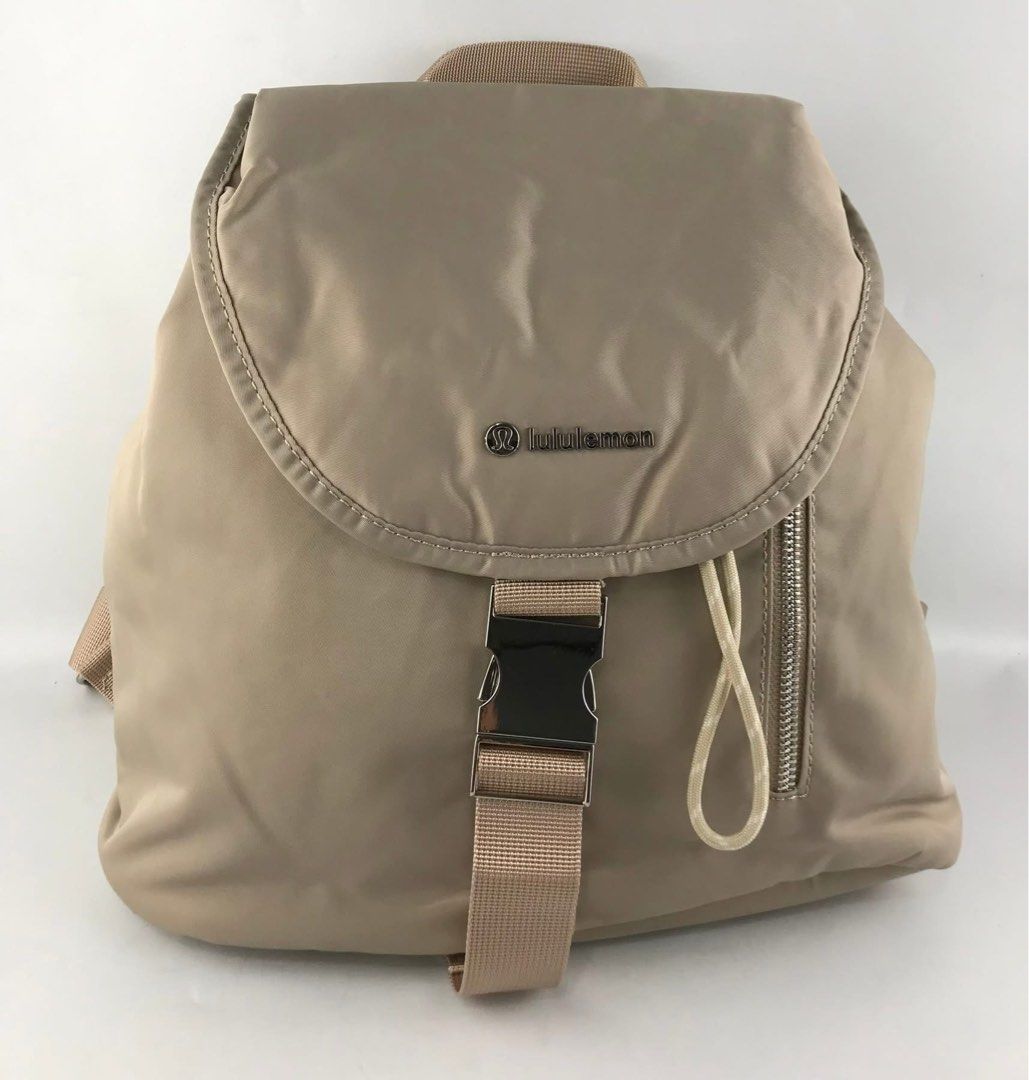 Lululemon Nylon Backpack Bag (Category: Backpacks) located in Bacoor. Submitted by faith.hope.love28 (Listing ID 1464830497, Image 3). Description: - Brand new with tag still attached - Material: 100% nylon body with recycled polyester lining - Closure: Secure buckle and drawstring main compartment - Pockets: Front flap side zip pocket, interior zippered pocket, and slip pocket - Comfort & Carry: Adjustable shoulder straps and top grab handle - C