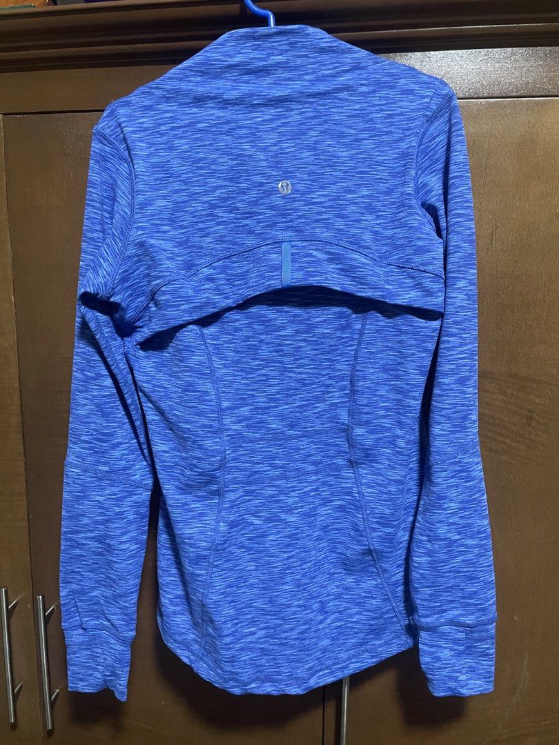 Lululemon Pilates / Workout Zip-Up Jacket in Blue (Category: Activewear) located in Bacolod City. Submitted by sznbyszn (Listing ID 1464923545, Image 3). Description: - Brand: Lululemon - Full zip front with signature pull, thumbholes, and secure zip hip pockets - Reflective upper back logo and structured paneling for a flattering, fitted look -fits small to medium (stretchy) Only issue back logo peel but still reflective and unnoticeable (see pi
