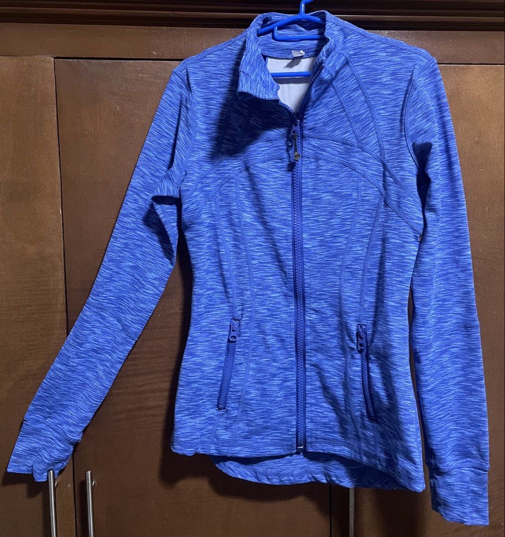 Lululemon Pilates / Workout Zip-Up Jacket in Blue (Category: Activewear) located in Bacolod City. Submitted by sznbyszn (Listing ID 1464923545, Image 2). Description: - Brand: Lululemon - Full zip front with signature pull, thumbholes, and secure zip hip pockets - Reflective upper back logo and structured paneling for a flattering, fitted look -fits small to medium (stretchy) Only issue back logo peel but still reflective and unnoticeable (see pi