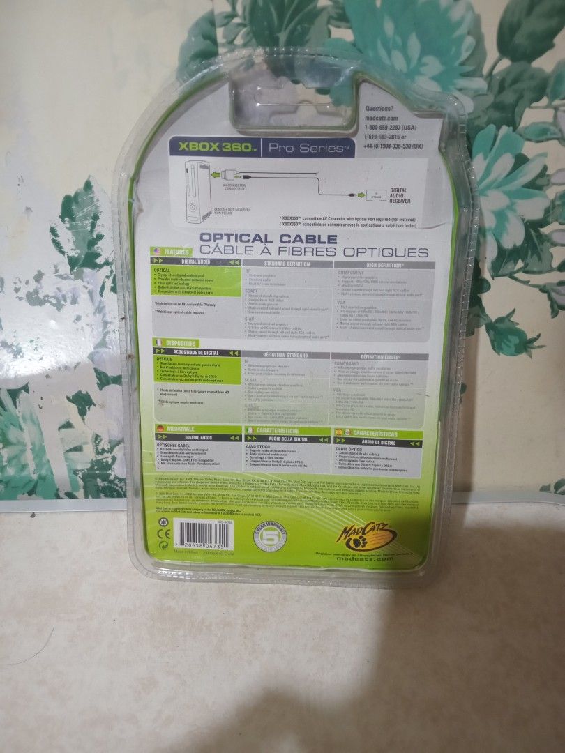 Mad Catz Xbox 360 Optical Cable 9ft (Category: Cables & Adaptors) located in Baguio. Submitted by loweasel (Listing ID 1464777294, Image 2). Description: - Authentic Mad Catz optical audio cable for Xbox 360 - Generous 9 feet (3 meters) length for flexible setup - Delivers crystal clear multi-channel surround sound - Brand new and still sealed in original blister packaging - Ideal for connecting your console to an audio receiver CAN DO SHIPPING C