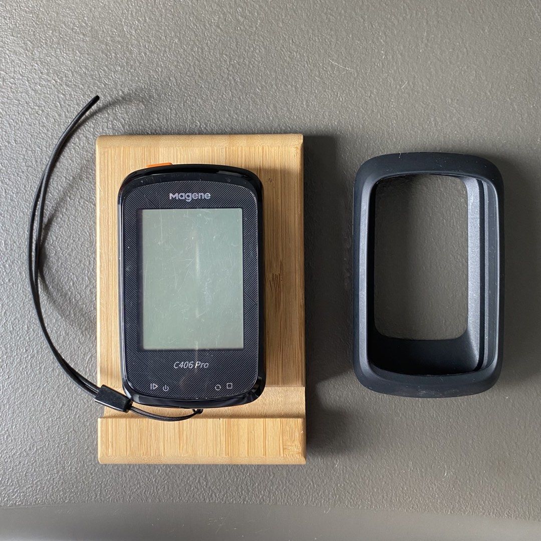 Magene C406 Pro GPS bike computer with silicone case (Category: Bicycles) located in Cavite. Submitted by clarenceaeron (Listing ID 1464811934, Image 2). Description: - Model: Magene C406 Pro GPS cycling computer (Black) - Condition: Screen has light scratches on screen protector from regular use, powers on and functions normally - Included Accessories: Black protective silicone case and wrist lanyard - Design: Distinctive orange power button on 