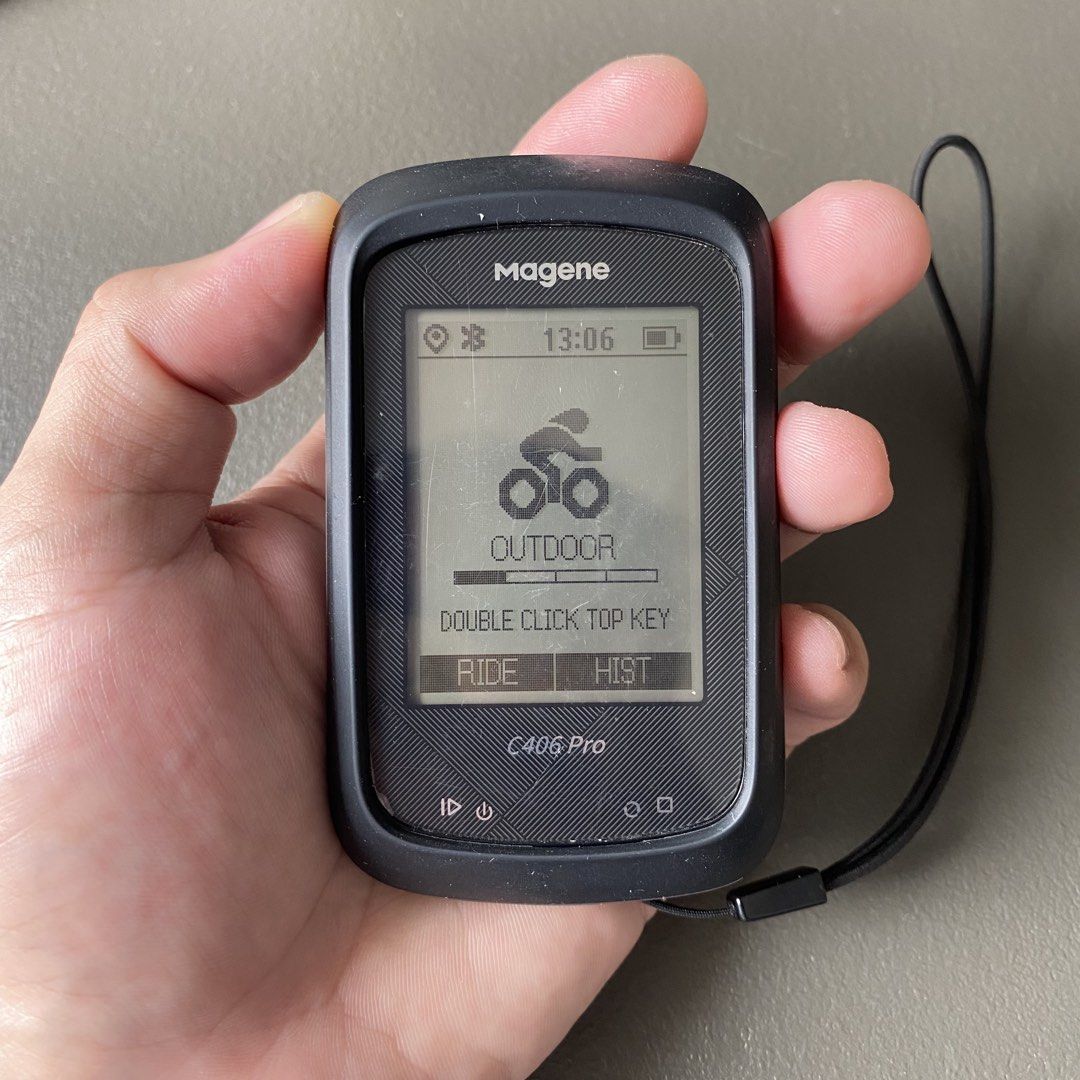 Magene C406 Pro GPS bike computer with silicone case (Category: Bicycles) located in Cavite. Submitted by clarenceaeron (Listing ID 1464811934, Image 1). Description: - Model: Magene C406 Pro GPS cycling computer (Black) - Condition: Screen has light scratches on screen protector from regular use, powers on and functions normally - Included Accessories: Black protective silicone case and wrist lanyard - Design: Distinctive orange power button on 