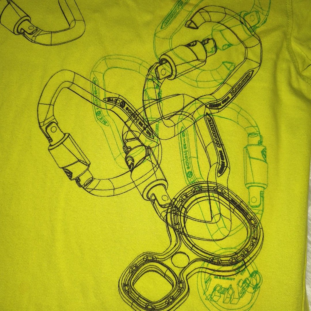 Mammut Graphic shirt (Category: Tshirts & Polo Shirts ) located in Antipolo. Submitted by alphaomega_fox (Listing ID 1464889503, Image 3). Description: - Brand/Model: Mammut t-shirt - Color/Design: Bright yellow with green trim and front climbing carabiner graphic - Logo: Small embroidered Mammut elephant logo on the left sleeve - Size: 21x29 - Condition: excellent condition 300 plus sf.
