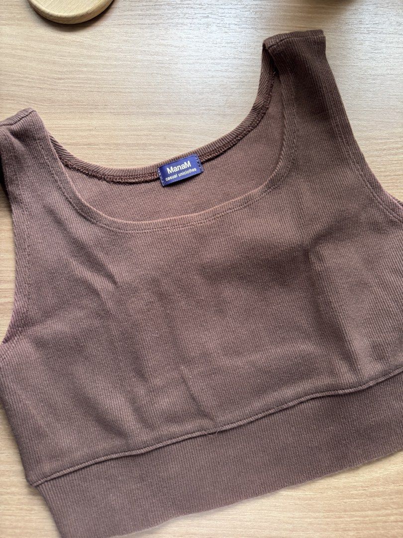 ManaM Brown Ribbed Crop Top Tank (Category: Sleeveless) located in Rizal. Submitted by yowfaveariesdeclutter (Listing ID 1464833602, Image 1). Description: - Brand: ManaM - Color: Brown - Style: Fitted crop top with wide scoop neckline and thick bottom band - Material: Ribbed fabric all over - Details: Label inside collar reads casual uniclothes RFS: not my style anymore Bought this from Bangkok!.