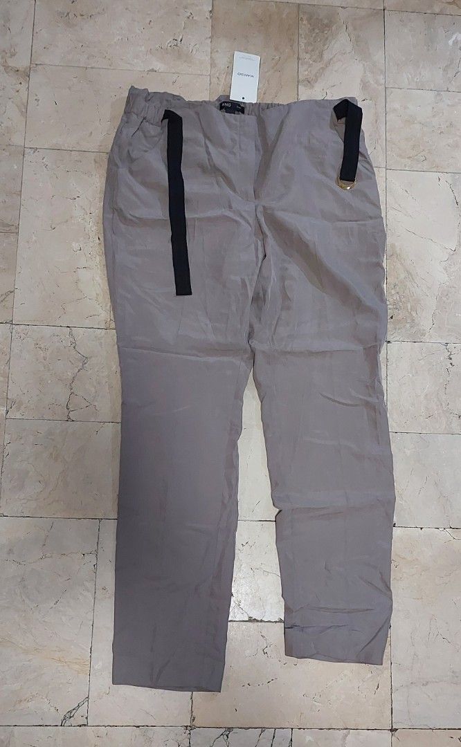 Mango Suit Marilia Trousers Ladies Pants Grey Size M (Category: Other Bottoms) located in Quezon City. Submitted by lisolette (Listing ID 1464785339, Image 1). Description: - Brand: Mango (Marilia trousers) - Condition: Brand new with original retail tags - Size: Medium (M) - Color: Grey - Material: Lightweight fabric - Closure: Front zipper and hook-and-bar - Special Feature: Elastic waistband with attached black belt and gold D-ring buckle bpi 