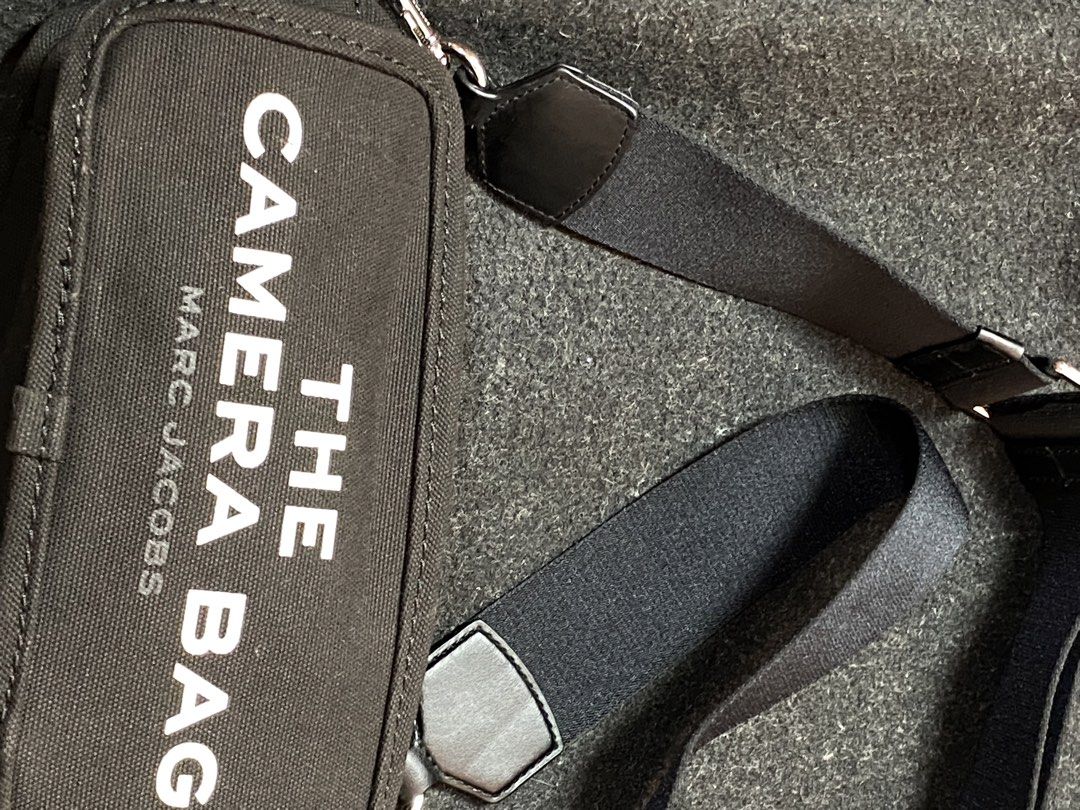 MARC JACOBS The Camera Bags (Category: Cross-body Bags) located in Quezon City. Submitted by loloyz123 (Listing ID 1464918012, Image 3). Description: MARC JACOBS The Camera Bags Condition: Very good Color rate: 10/10 Color: Black/ canvas Size: L: 11cm W: 23cm depth: 8.5cm.