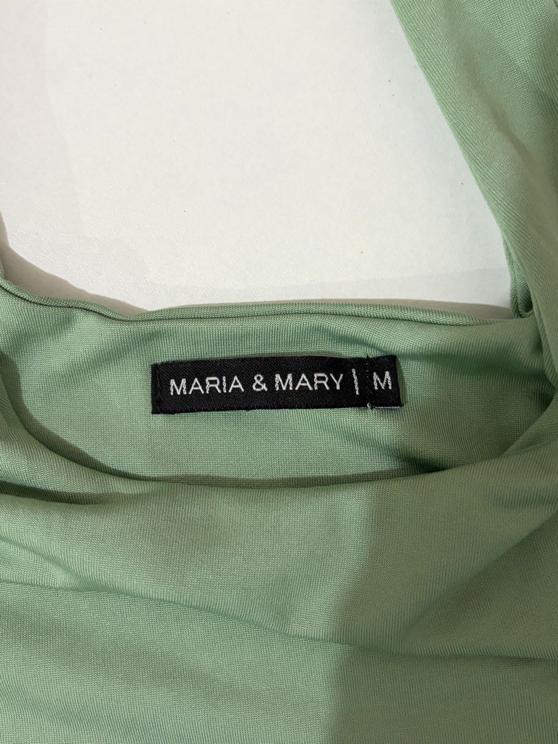 Maria & Mary Bodysuit Set Green White (Category: Sets or Coordinates) located in Cainta. Submitted by knarv__ (Listing ID 1464882442, Image 3). Description: Maria & Mary bodysuits in size M. Includes 1 sage green tank style with snap buttons and 1 white halter style with twisted straps. Both made of soft, stretchy, clean fabric. Perfect wardrobe basics for pairing with jeans or skirts..