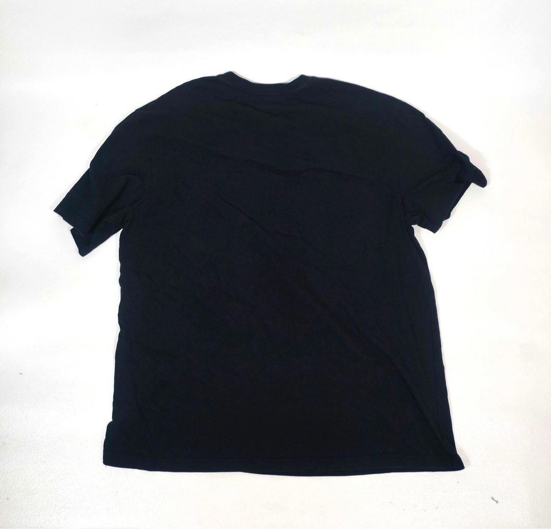 Martine Rose Black Upside Down Logo T-Shirt (Category: Tshirts & Polo Shirts ) located in Manila. Submitted by yesterdaysfinds (Listing ID 1464864821, Image 3). Description: Martin Rose Fade Logo Condition : Verygood Size : Large Dimension : 22 x 29 📌 Brand: Martine Rose - Color: Black with contrasting grey upside-down logo on chest - Material: 100% Cotton (Made in Portugal) - Fit: Regular fit, crew neck, short sleeves - Condition: Clean fabric 