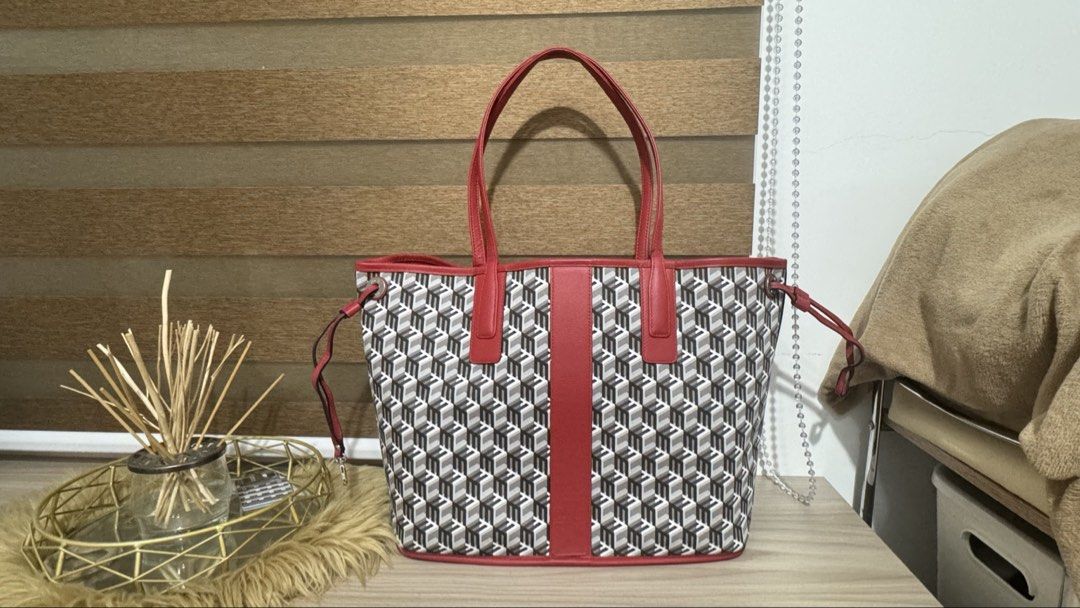 MCM Reversible Shopper Tote Bag Red Geometric (Category: Tote Bags) located in Cainta. Submitted by katchers (Listing ID 1464828282, Image 2). Description: - 100% Authentic MCM Reversible Shopper Tote - Features striking red Visetos monogram on one side and a modern geometric print on the reverse - Includes a matching detachable zip pouch and original tags - Spacious interior easily fits daily essentials - Dual shoulder straps for comfortable car