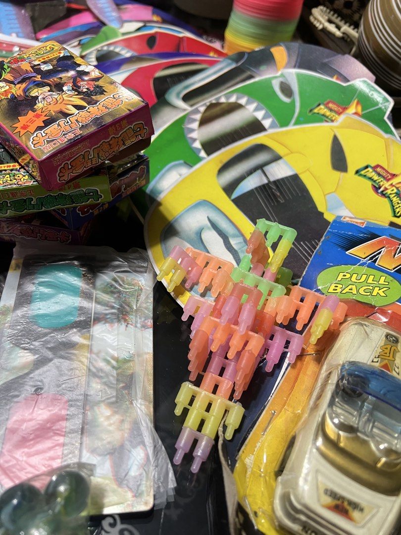 Memorabilia collectibles vintage (Category: Action & Battle Toys) located in Manila. Submitted by cterrineni76861 (Listing ID 1464884283, Image 2). Description: Massive collection of vintage childhood toys and games. Includes two classic brick game handheld consoles, wooden slingshot, plastic toy cars, blow balloon tubes, paper airplanes, marbles, 3D glasses, Dragon Ball boxes, and assorted novelty items. Nostalgic items for collectors or retro g